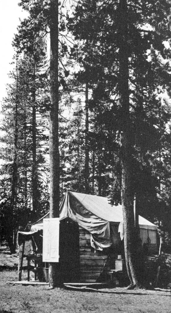 Camping Out Back of the Rim, historic photograph Black and white print 6 1/4 x 3 3/4 inches Photographer: H. T. Cowling This image is a scan of a print from a Department of the Interior, Crater Lake National Park brochure. The brochure is part of the Crater Lake Institute's collection of historical items.